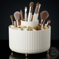 Rotating makeup organizer filled with brushes and skincare bottles