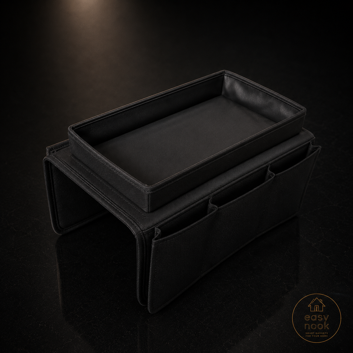 Sofa armrest organizer with pockets holding a remote and phone
