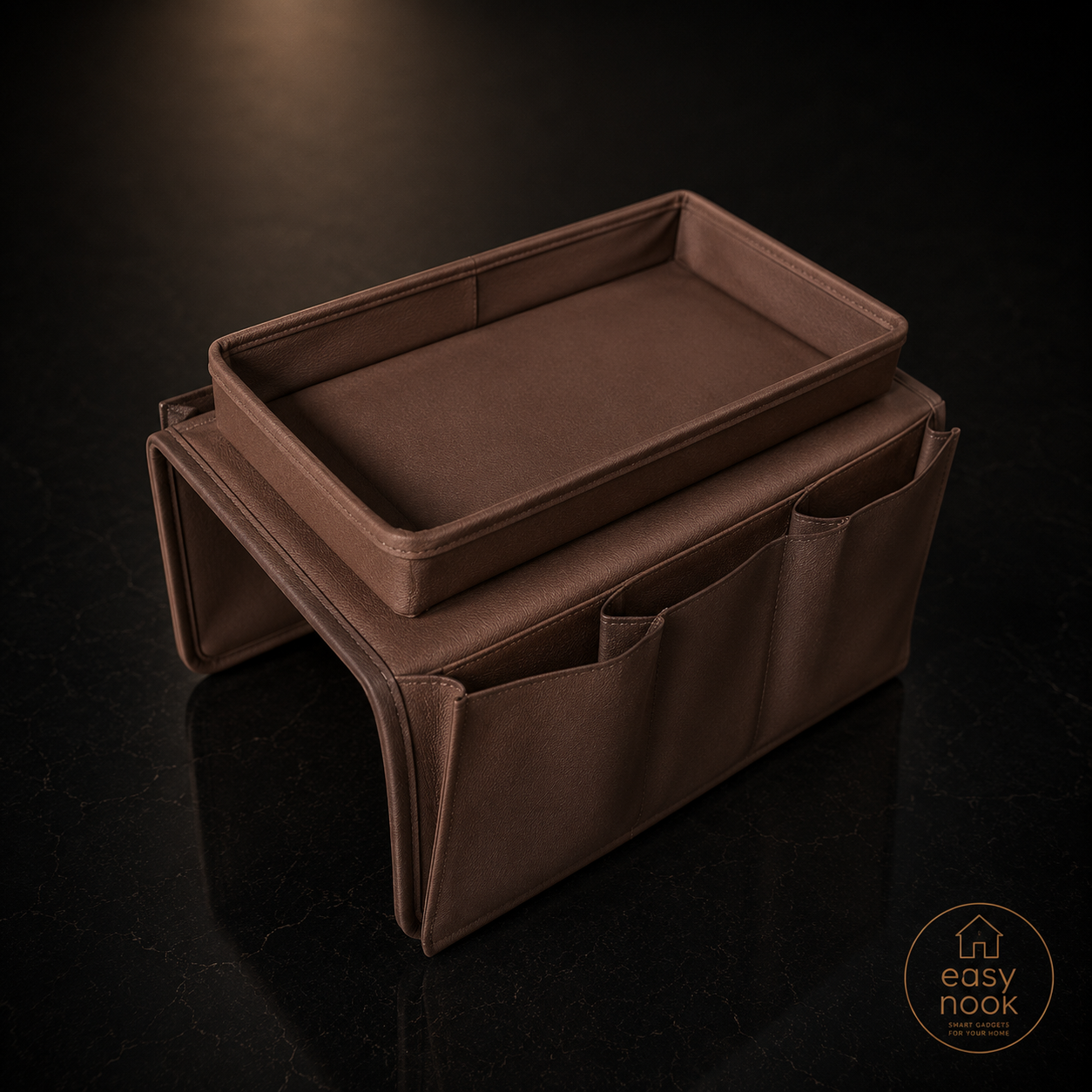 Sofa armrest organizer with pockets holding a remote and phone