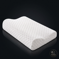 White contoured memory foam neck pillow on dark background